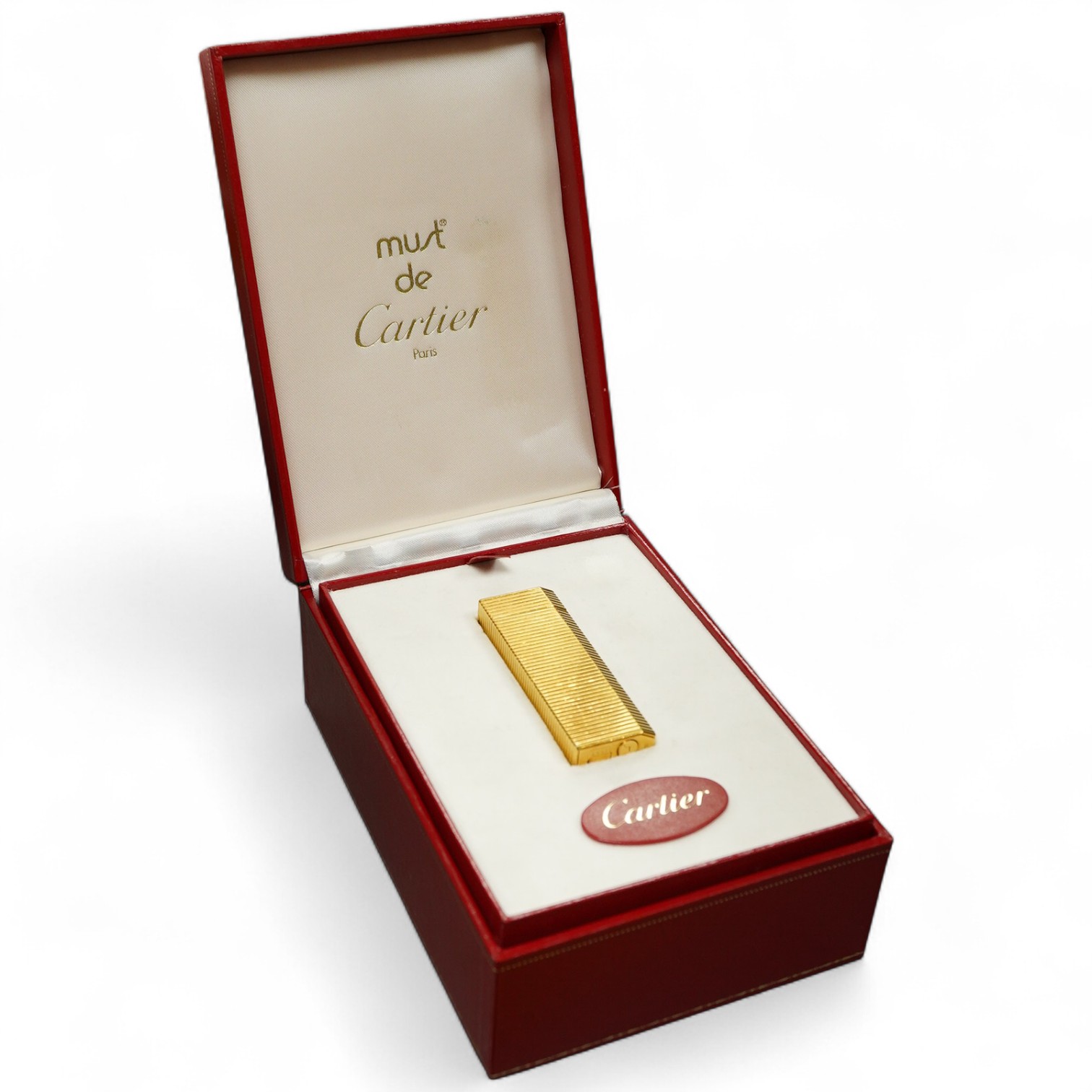 A cased Must de Cartier lighter, with certificate